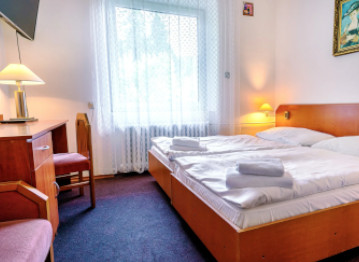 Útulné pokoje v hotelu Stella na Šumavě